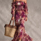 Robe longue en mousseline rose fleurie à épaules dénudées