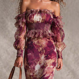 Robe longue en mousseline rose fleurie à épaules dénudées