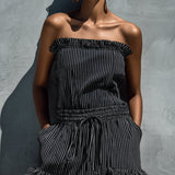 Combinaison bustier à rayures noir et blanc avec volants