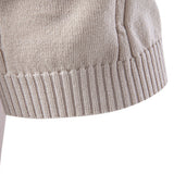 Polo en maille torsadée et pantalon droit à taille élastique