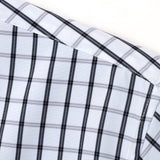 Chemise à carreaux à manches longues et boutons