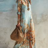 Robe longue en mousseline bleue à fleurs style baroque