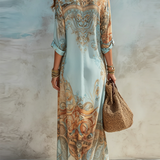 Robe longue en mousseline bleue à fleurs style baroque