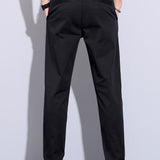 Polo en maille torsadée et pantalon droit à taille élastique