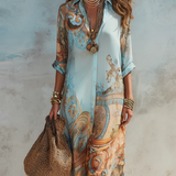 Robe longue en mousseline bleue à fleurs style baroque