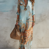 Robe longue en mousseline bleue à fleurs style baroque