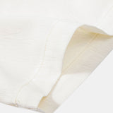 Chemise cubaine à contraste texturé et pantalon droit