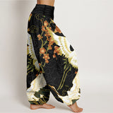 Pantalon harem motifs grues et fleurs