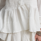 Blouse à taille smockée en tissu doux