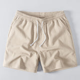 Polo à col en V en crochet coupe décontractée et short 5" texturé froissé à cordon de serrage