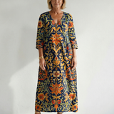 Elise | Robe midi fleurie, ornée et épurée