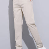 Polo en maille torsadée et pantalon droit à taille élastique