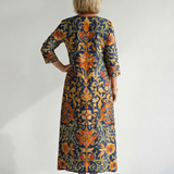 Elise | Robe midi fleurie, ornée et épurée