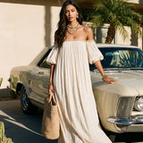Robe longue plissée ivoire style bohème à épaules dénudées