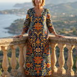Elise | Robe midi fleurie, ornée et épurée