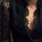 Haut blazer élégant à manches et empiècements en dentelle noire