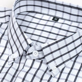 Chemise à carreaux à manches longues et boutons