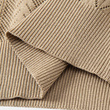 Polo en maille ajourée à motif jacquard géométrique et pantalon droit côtelé
