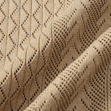 Polo en maille ajourée à motif jacquard géométrique et pantalon droit côtelé