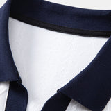 Polo en maille jacquard à motif géométrique contrastant et pantalon fuselé coupe ajustée