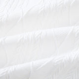 Polo en maille jacquard à motif géométrique contrastant et pantalon fuselé coupe ajustée