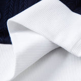 Polo en maille jacquard à motif géométrique contrastant et pantalon fuselé coupe ajustée