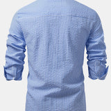 Chemise boutonnée en seersucker rayé