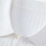 Polo en maille texturée contrastée et pantalon fuselé coupe slim