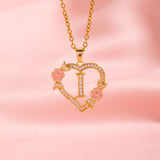 Collier initiale charme floral | Or