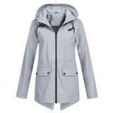 Amélie Laurent | Imperméable long à capuche pour femme, finition minimaliste
