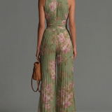 Combinaison ample en mousseline plissée verte à motif floral, encolure en V, sans manches et fermeture éclair.