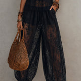 Ensemble caraco noir dos nu bordé de dentelle et pantalon sarouel