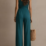 Combinaison bohème bleu-vert à jambes larges, fendue et garnie de dentelle
