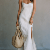 Robe longue fendue à fines bretelles, blanche et minimaliste