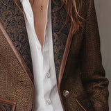 Veste en tweed à chevrons avec empiècements imprimés