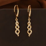 Boucles d'oreilles Shimmer Twist Ava | Or