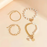 Ensemble de 4 bracelets chic doré - Serpent, perles et maillons | Doré