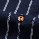 Chemise boutonnée à rayures en mélange de coton et pantalon droit en lin